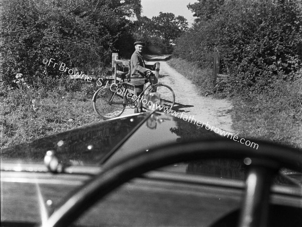 ROADSIDE SCENE  CYCLIST THROUGH WINDSCREEN